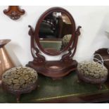 A pair of Victorian walnut carved footstools and a mahogany toilet mirror (3) Condition Report: