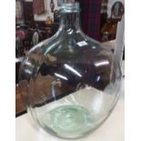 A glass carboy, 55cm high Condition Report: Available upon request