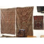 A Bokhara rug,170cm x 114cm an Eastern rug, 180cm x 106cm and a prayer mat (3) Condition Report: