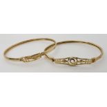 Two 9ct gold Mackintosh style bangles, weight together 11gms Condition Report: Available upon