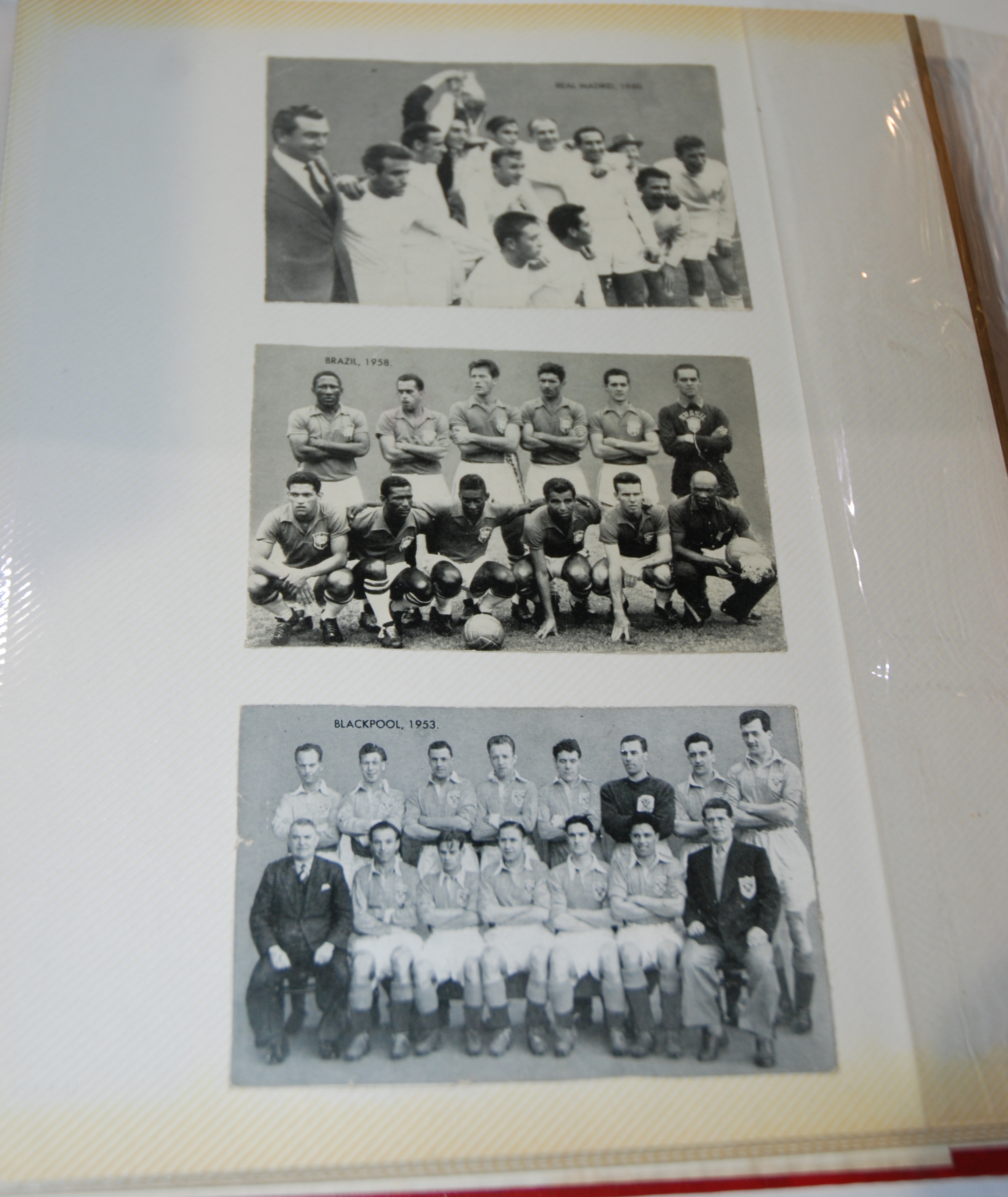 An album of various cards and postcards including Cup Tie Stars, Famous Teams in Football History,