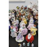 A collection of The Flower Maidens of the year figures, Hummel figures, Border Fine Arts, bird