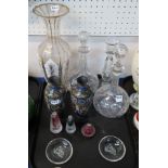 A pair of glass dishes depicting a figure blowing bubbles, three scent bottles, a pair of
