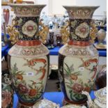 A pair of Chinese reproduction vases decorated with birds and peony's Condition Report: Available
