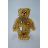 A modern Steiff Teddy bear with Wedgwood medallion, two other Teddy bears and two Corgi Eddie