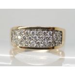 A 9ct gold diamond dress ring set with estimated approx 0.50cts of brilliant cut diamonds, finger