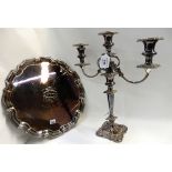 A lot comprising a silver plated three-light candelabrum and an EP salver, 40cm high and 36cm