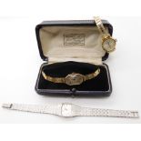A 9ct cased ladies vintage watch with rolled gold strap, and two ladies Omega watches Condition
