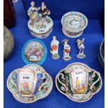 Two Augustus Rex style cups and saucers, two small Naples figures, another figure, Sevres style
