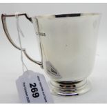 A silver mug, London 1934, 8.8cm high, 176gms Condition Report: Available upon request