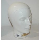 A ceramic head, 29cm high Condition Report: Available upon request