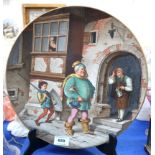 A pottery platter, painted with Falstaff and his gage, 36cm diameter Condition Report: Available
