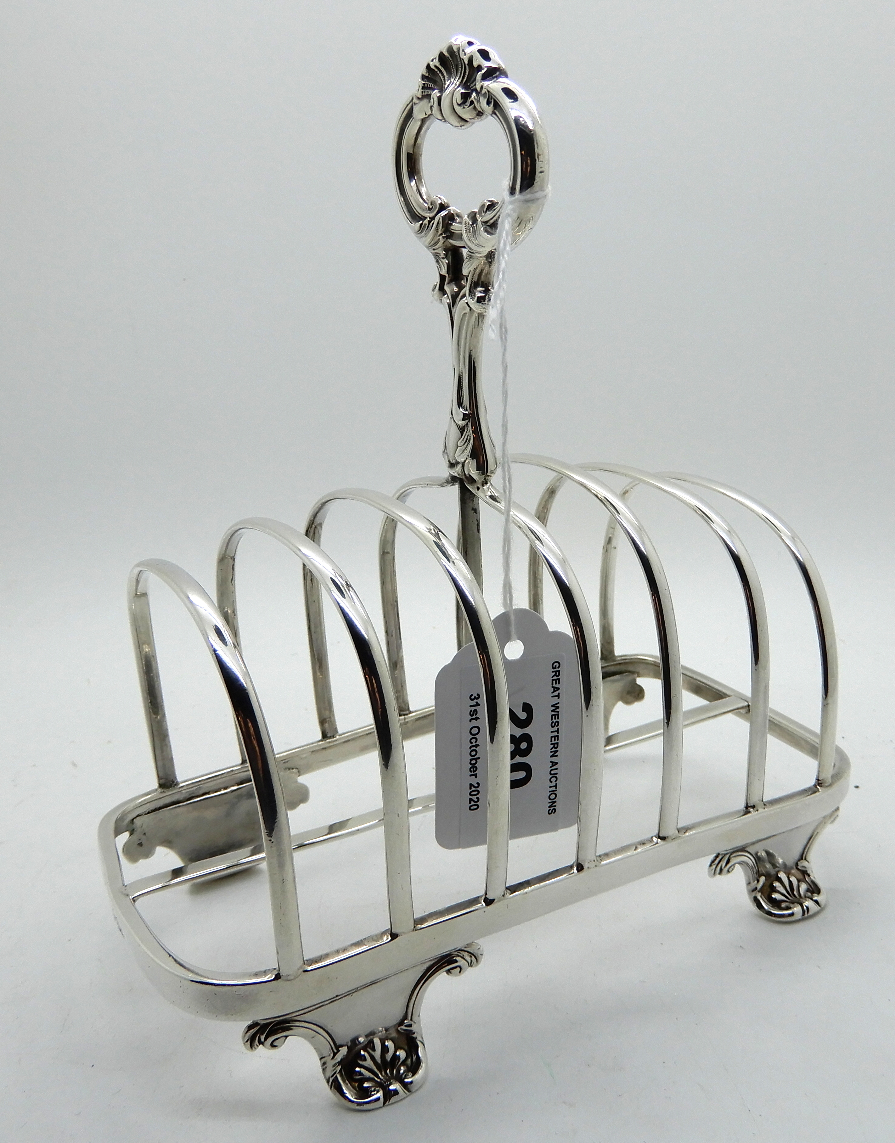 A silver toastrack, Sheffield 1838, 15.5cm long, 277gms Condition Report: Available upon request