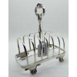 A silver toastrack, Sheffield 1838, 15.5cm long, 277gms Condition Report: Available upon request