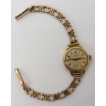 A 9ct gold ladies Buren Grand Prix wristwatch, weight including mechanism 17.4gms Condition