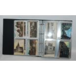 Two albums of colour and black and white vintage and later postcards Condition Report: Available