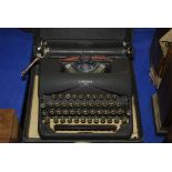 A Corona typewriter in case Condition Report: Available upon request