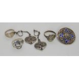 A silver ring by I.C.A, a Derby and Son Alexander Ritchie style pattern brooch and other things