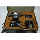 A Praktica camera, additional lenses in carry case and a Zeiss Ikon camera (2) Condition Report: