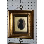 A pair of early silhouettes, 8 x 5cm, framed and glazed Condition Report: Available upon request