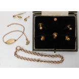 Five 9ct gold shirt studs, 9ct curb chain bracelet, id bracelet and a brooch all (af) weight 14.3gms