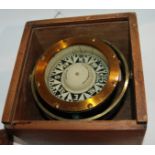 A cased compass by Joseph Lawerence & Co, Glasgow Condition Report: Available upon request