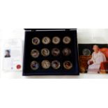 A cased set of twelve gold plated commemorative coins and a 2012 jubilee set Condition Report: