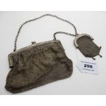 A lot comprising a silver and metal mesh purse, London 1916 and a small metal mesh purse Condition