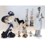 A Royal Doulton figure of a King Charles Spaniel, Wedgwood figure Star Scatterer, Nao figure of a