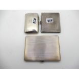 A lot comprising three silver cigarette cases (assorted marks), 340gms Condition Report: Available