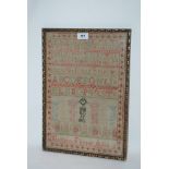 An early alphabet sampler by Margaret Fleming, 45 x 30cm, framed and glazed Condition Report: