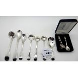 A silver caddy spoon, London 1812, with a sifter, ladle and eight various mustard and salt spoons (