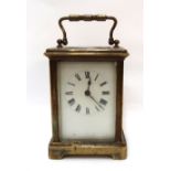 A French brass and glass carriage clock Condition Report: Available upon request
