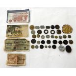 A small quantity of coins, church tokens, banknotes and two replica German badges Condition