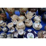 A Victorian puce and flower decorated teaset and other similar pieces Condition Report: