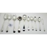 A lot comprising three silver fruit spoons, Sheffield 1897 and assorted teaspoons, a butter knife, a