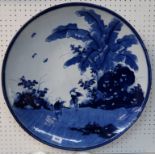 A large blue and white oriental charger depicting figures, 54cm diameter (cracked) Condition Report: