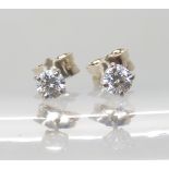 A pair of 9ct white gold diamond stud earrings, set with estimated approx 0.33cts of brilliant cut