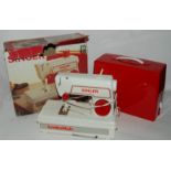 A child's Singer sewing machine and a Singer sewing machine (2) Condition Report: Available upon