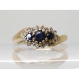 A 9ct gold sapphire and diamond ring, size J1/2, weight 2.3gms Condition Report: Available upon