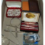A cased set of sterling bridge pencil, white-metal belt buckle, decanter labels etc Condition