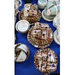 A Royal Crown Derby teaset comprising two cake plates, twelve cups, saucers and plates, sugar bowl