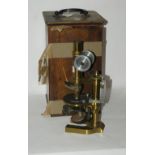 A brass microscope in case (def) Condition Report: Available upon request