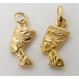 Two bright yellow metal Cleopatra pendants with Arabic hallmarks, weight 4.6gms Condition Report: