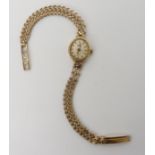 A 9ct gold ladies Uno watch, weight including mechanism 11.2gms Condition Report: Available upon