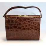 A vintage crocodile skin handbag Condition Report: Available upon request