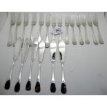 A part suite of silver cutlery, Sheffield 1915 comprising six dinner forks, five dessert forks,