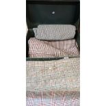 Assorted woolen plaid material off cuts Condition Report: Not available for this lot