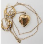 A 9ct back and front heart shaped locket and a pair of 9ct earrings, total weight 5.8gms Condition