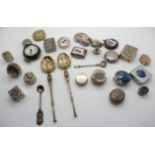 A lot comprising assorted silver and silver plate pill boxes, gilt anointing spoons, pair cased
